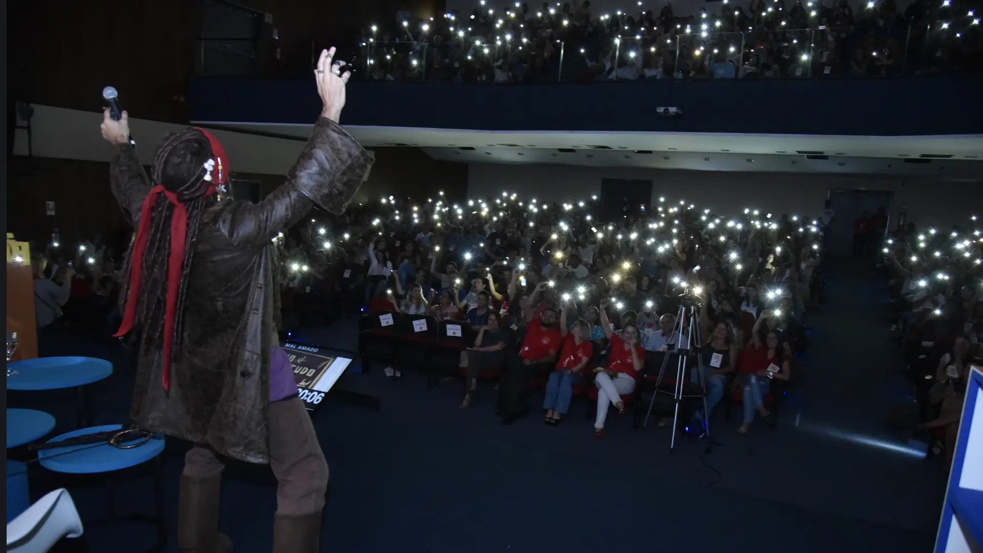 Q9 em evento com arena lotada